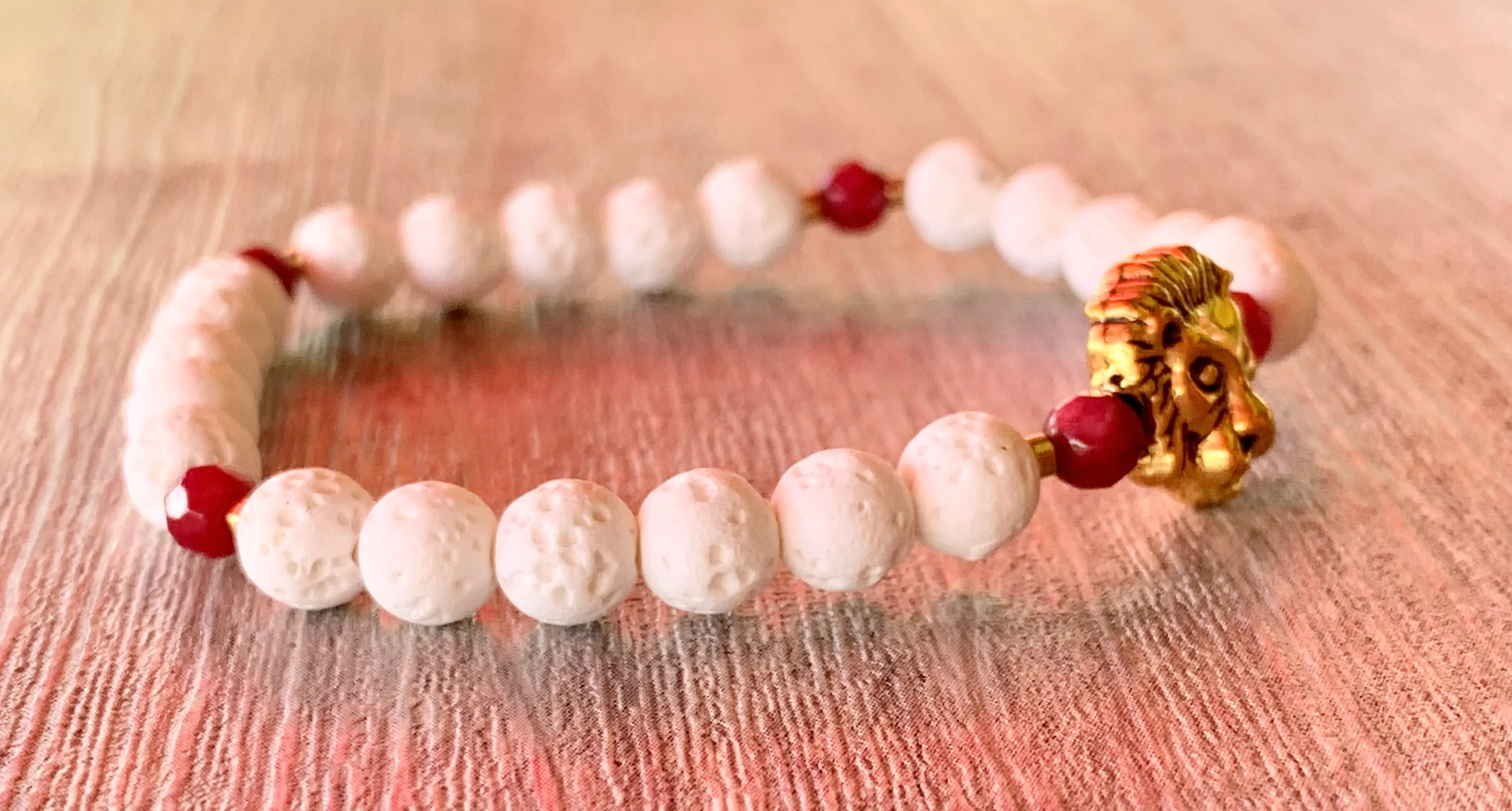 Leo Handmade Ruby, Gold Plated Hematite, and White Lava Or Black Wood Beaded Expandable Bracelet with Lion Charm