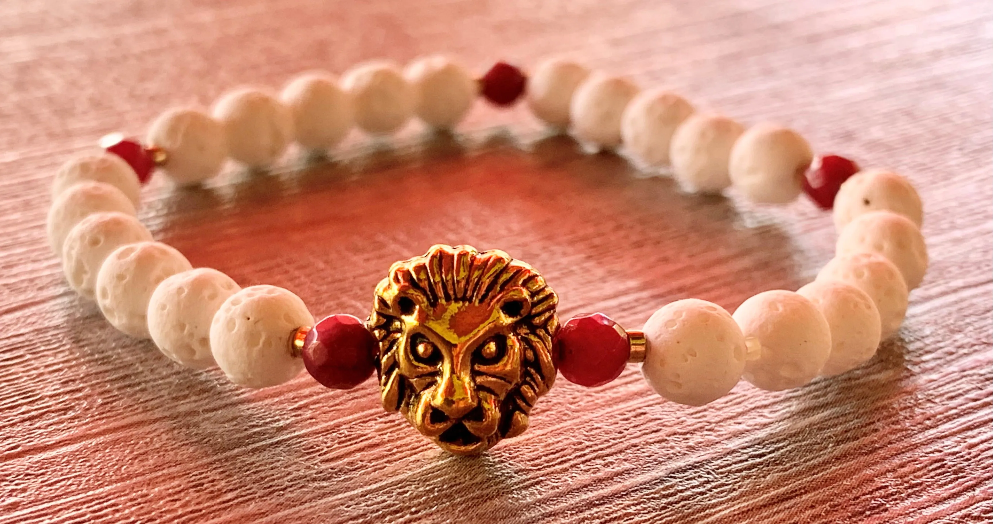 Leo Handmade Ruby, Gold Plated Hematite, and White Lava Or Black Wood Beaded Expandable Bracelet with Lion Charm