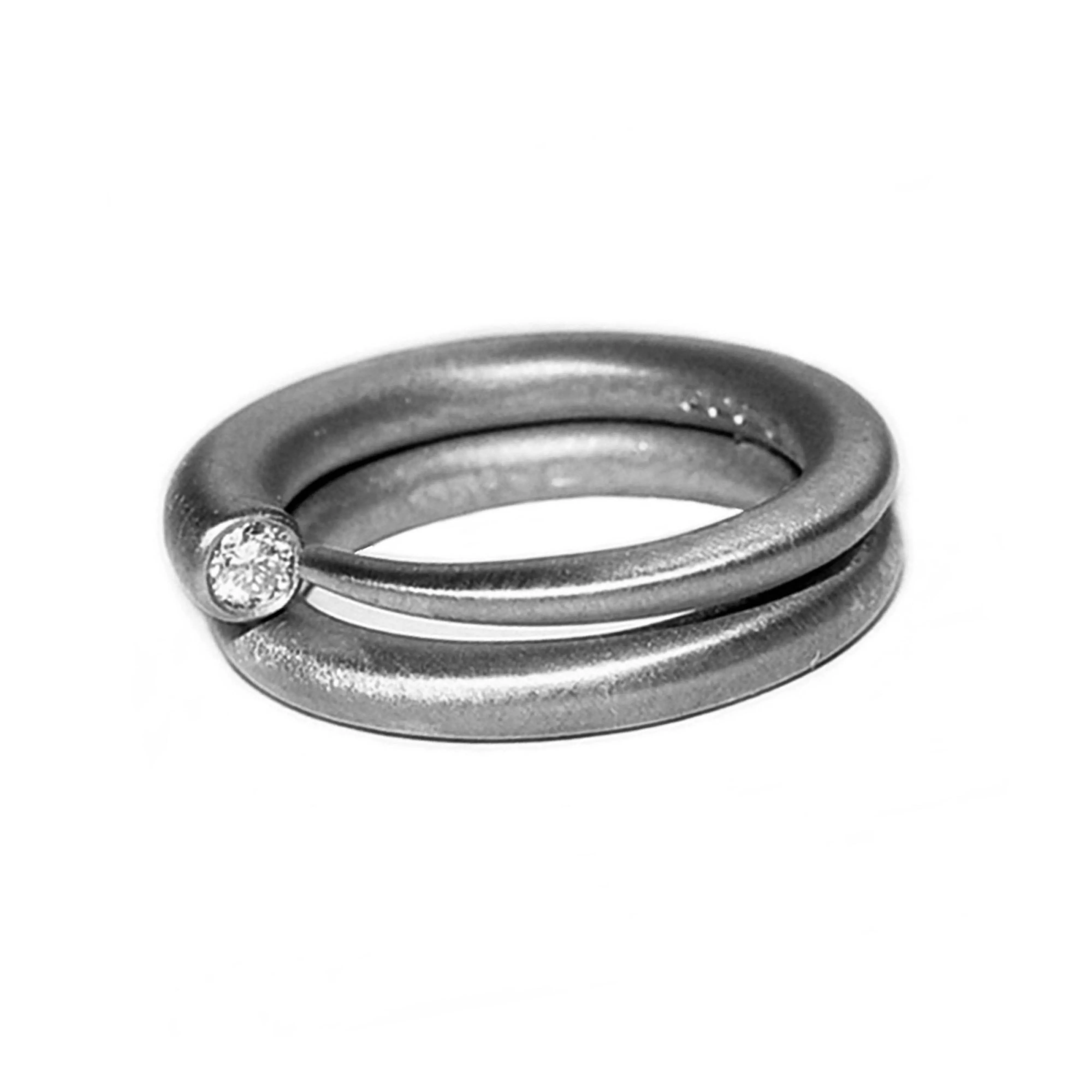 Narrow tapering silver ring with 3pt diamond