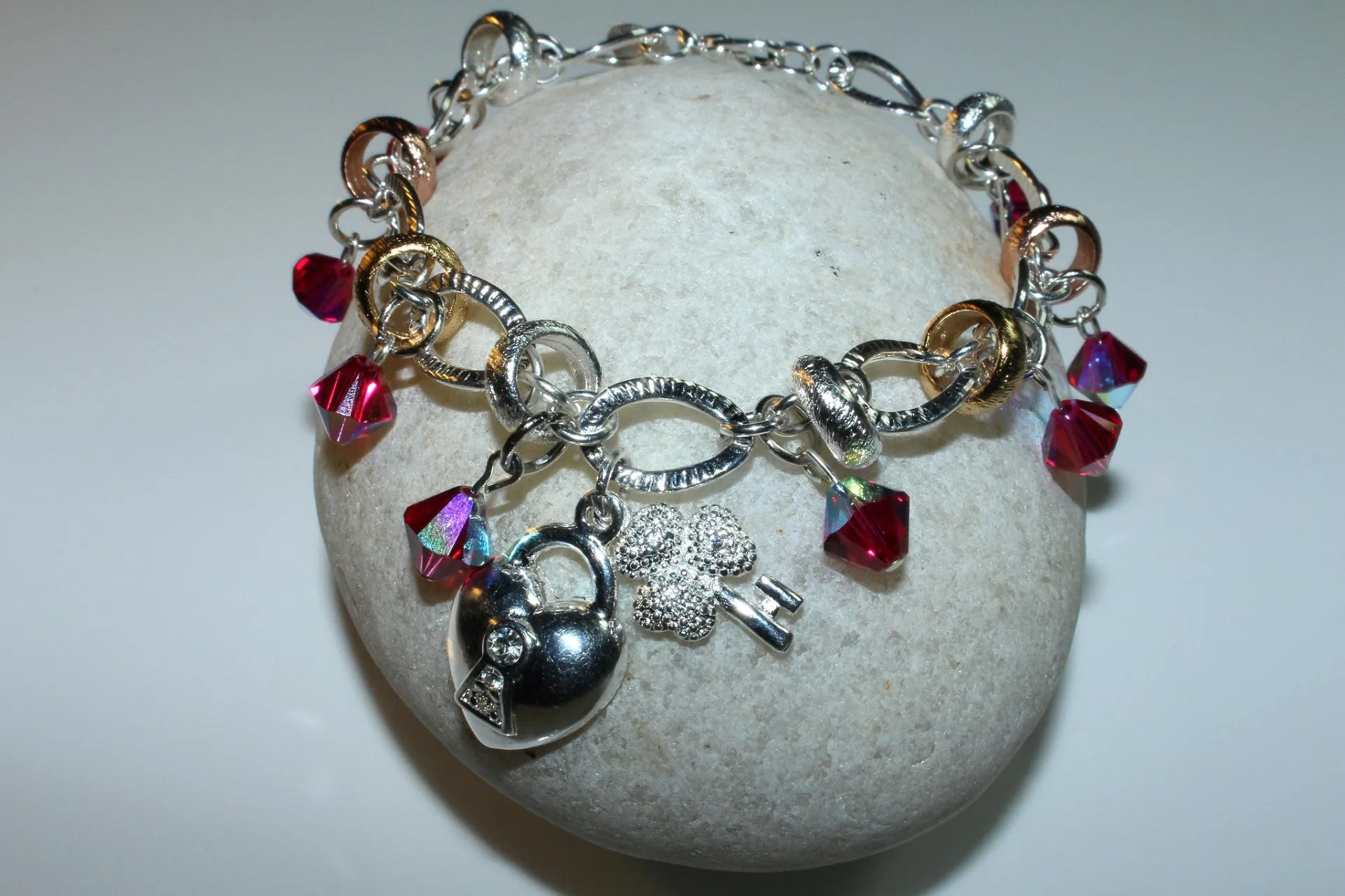 Swarovski Crystals Ruby, Heart And Key Silver Charms Bracelet