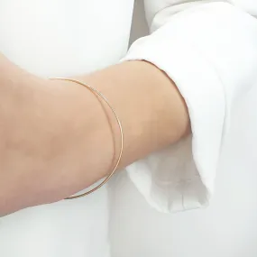 Thin gold bangle