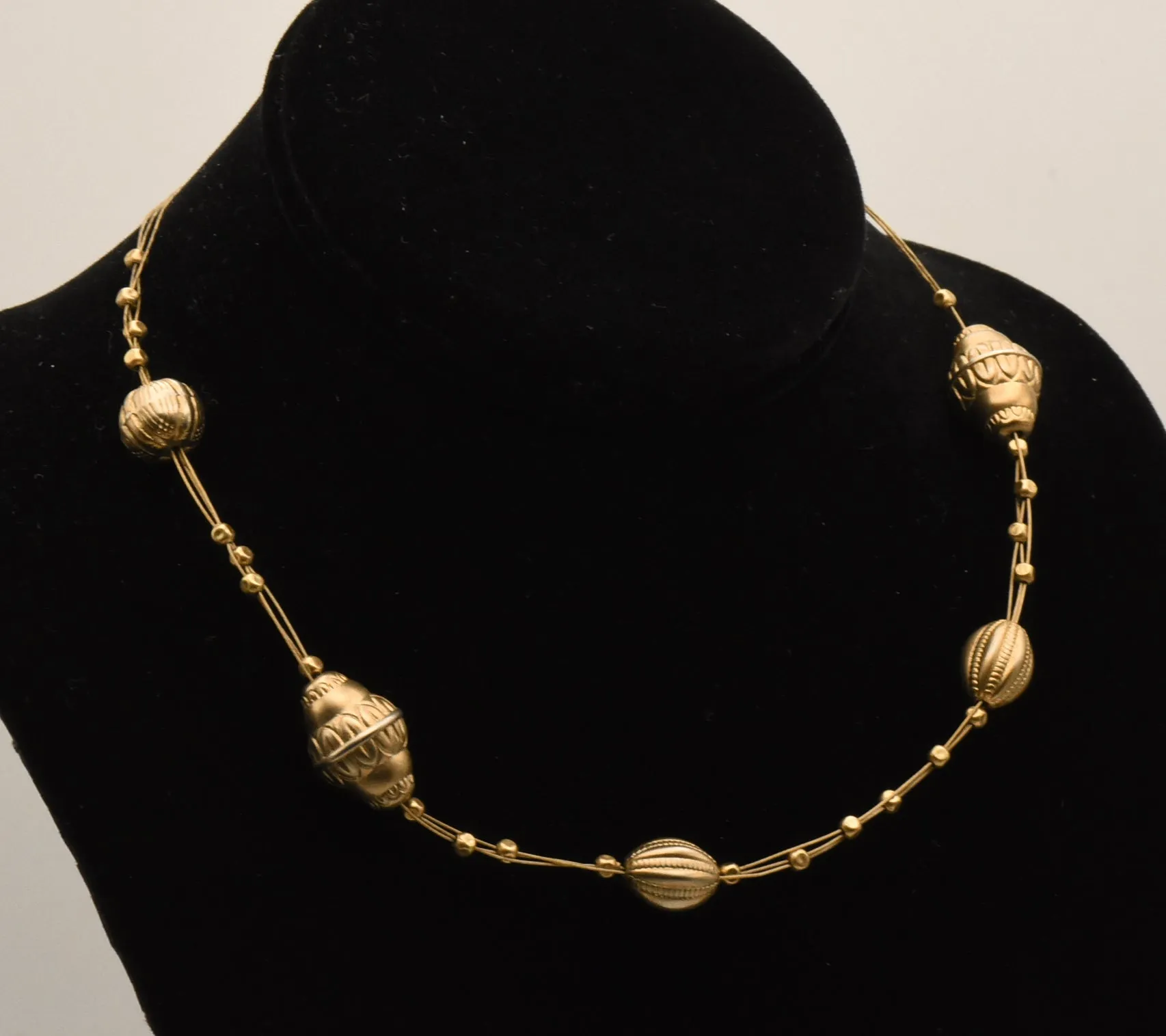 Triple Cable Gold Tone Beaded Station Necklace